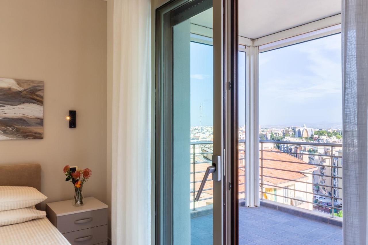 Terrazza61 - Appartamento Con Vista Spettacolare Sulla Citta Di กาญารี ภายนอก รูปภาพ