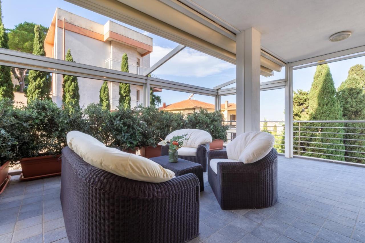 Terrazza61 - Appartamento Con Vista Spettacolare Sulla Citta Di กาญารี ภายนอก รูปภาพ