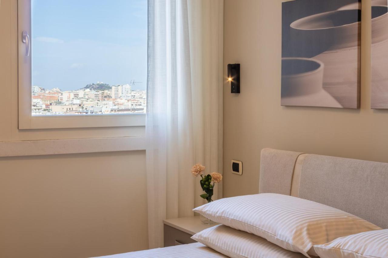 Terrazza61 - Appartamento Con Vista Spettacolare Sulla Citta Di กาญารี ภายนอก รูปภาพ